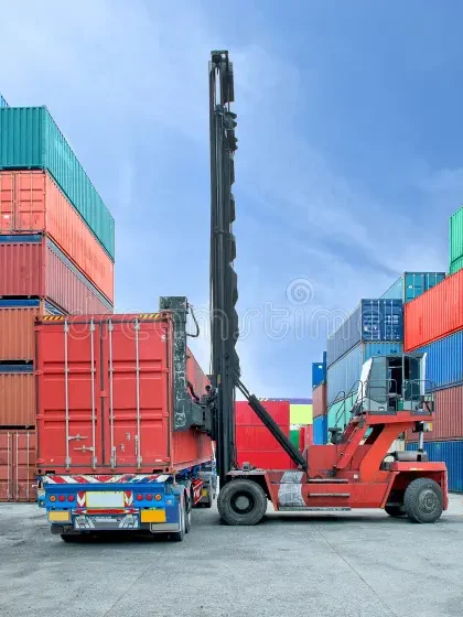 forklift handling container box loading to truck dock 43158751
